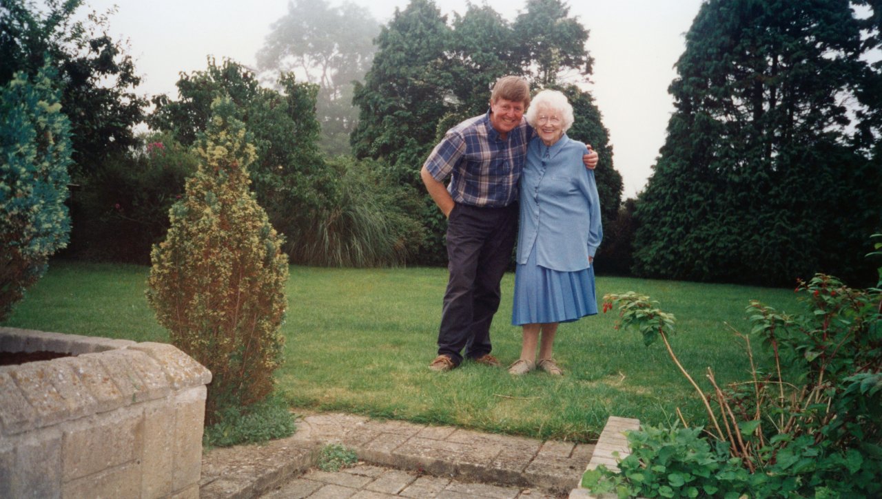 Adrian with his Mom in her backyard 2001